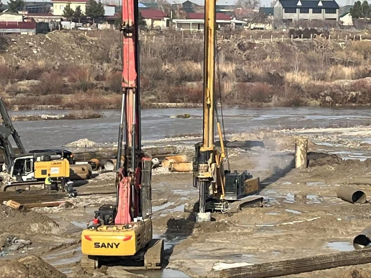 SANY and rotary drilling rigs side by side on site